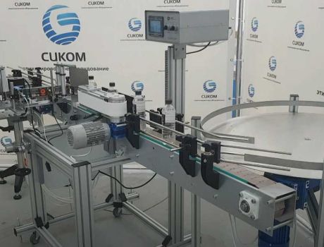 Этикетировочная машина для нанесения прозрачного стикера контроля вскрытия упаковки